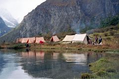
We soon came to our idyllic campsite at a place called Joksam (4000m), our tents mirrored in the slow moving river beneath a hill forested with green trees.
